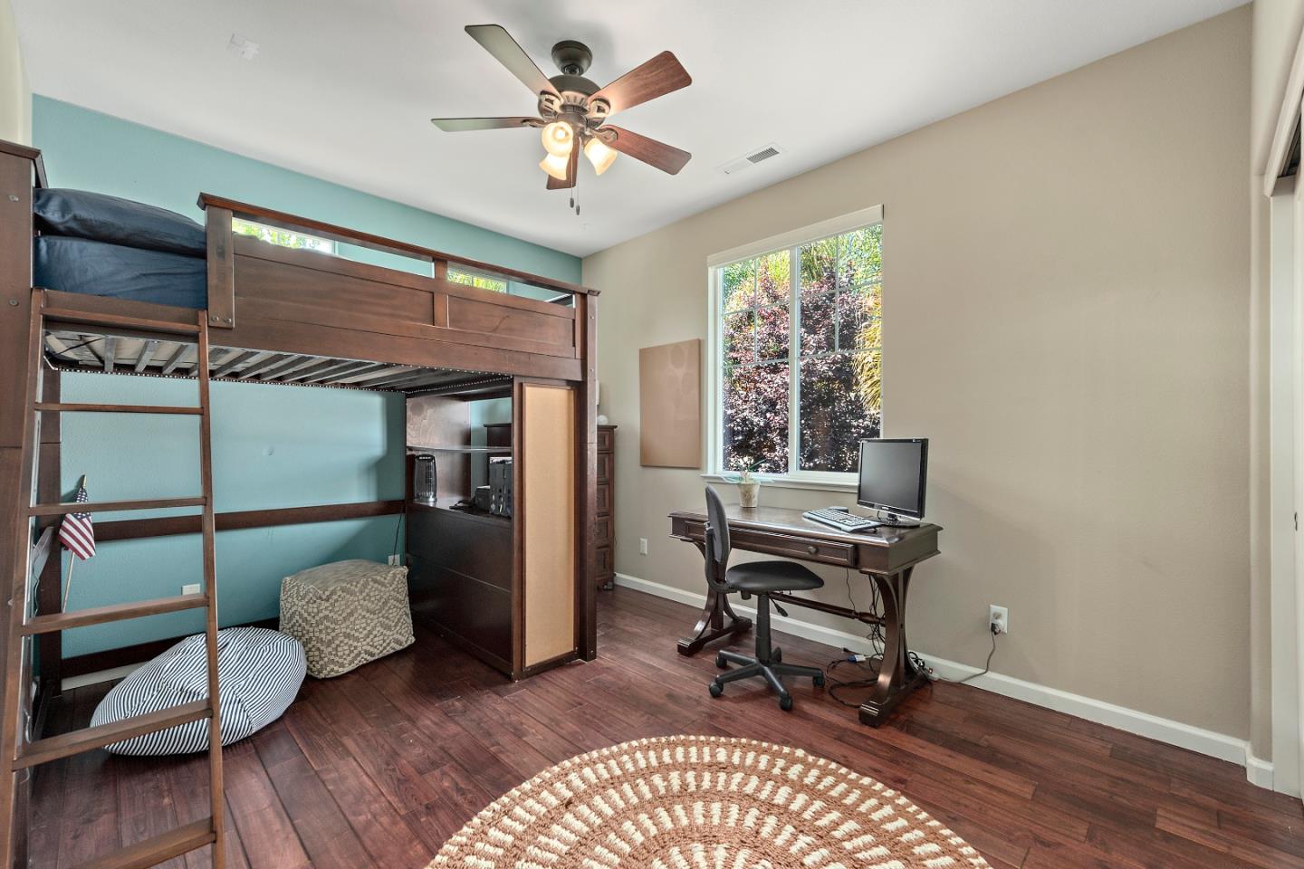 7581 Edinburgh Way Gilroy, CA 95020 - Photo 23 of 38 a view of a workspace with furniture and a window