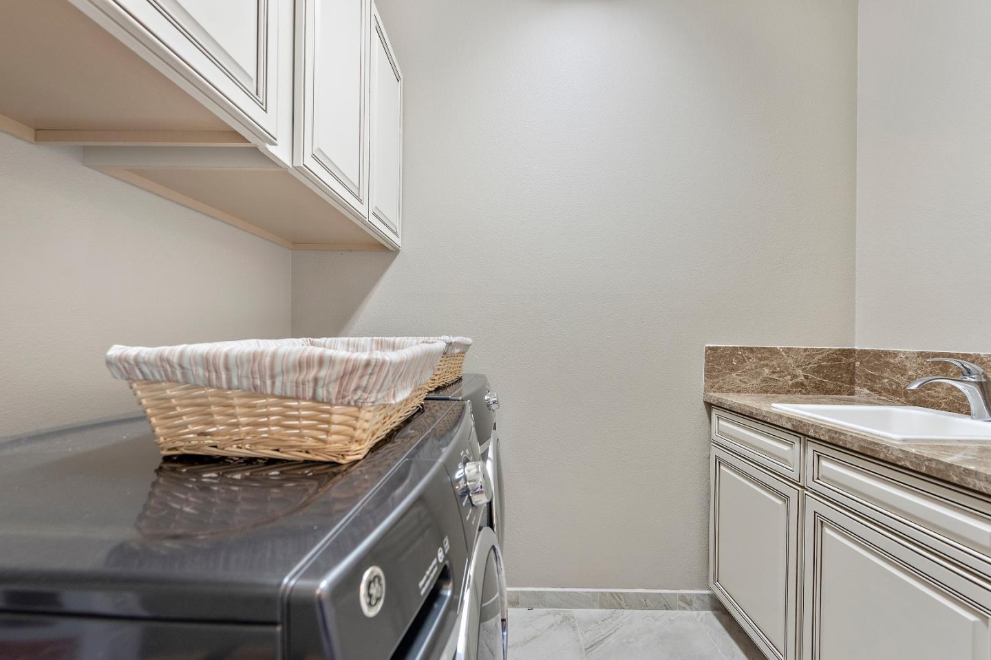 7581 Edinburgh Way Gilroy, CA 95020 - Photo 26 of 38 a utility room with washer and dryer