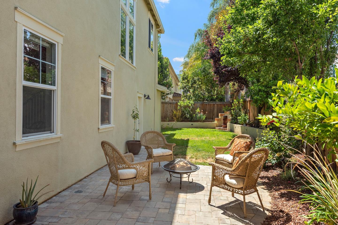 7581 Edinburgh Way Gilroy, CA 95020 - Photo 31 of 38 a view of a swimming pool with chair and table in the patio