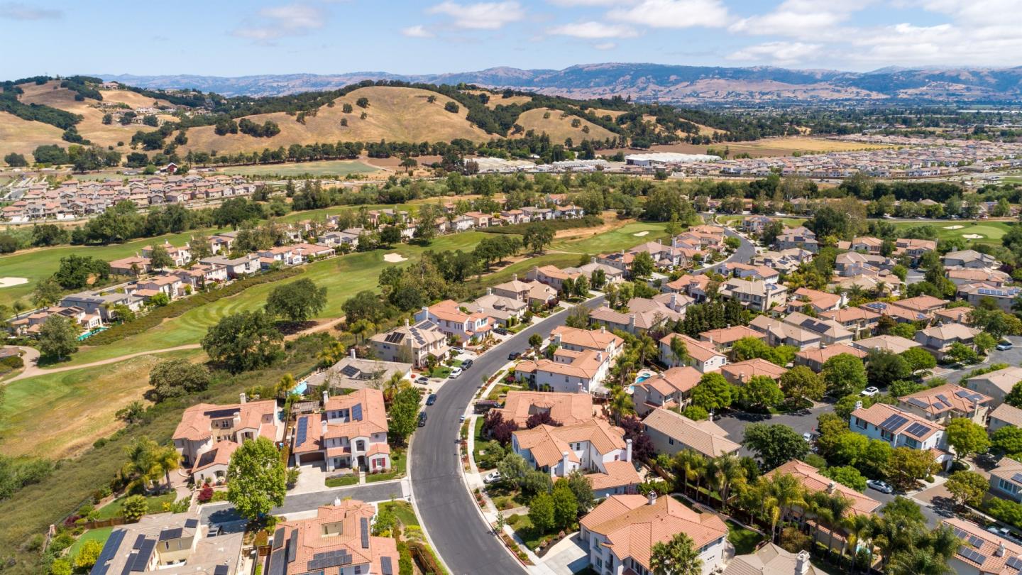 7581 Edinburgh Way Gilroy, CA 95020 - Photo 35 of 38 an aerial view of residential houses with outdoor space