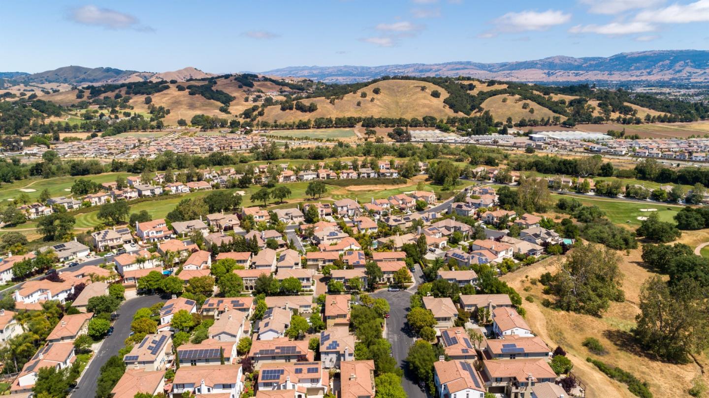 7581 Edinburgh Way Gilroy, CA 95020 - Photo 36 of 38 an aerial view of residential houses with outdoor space