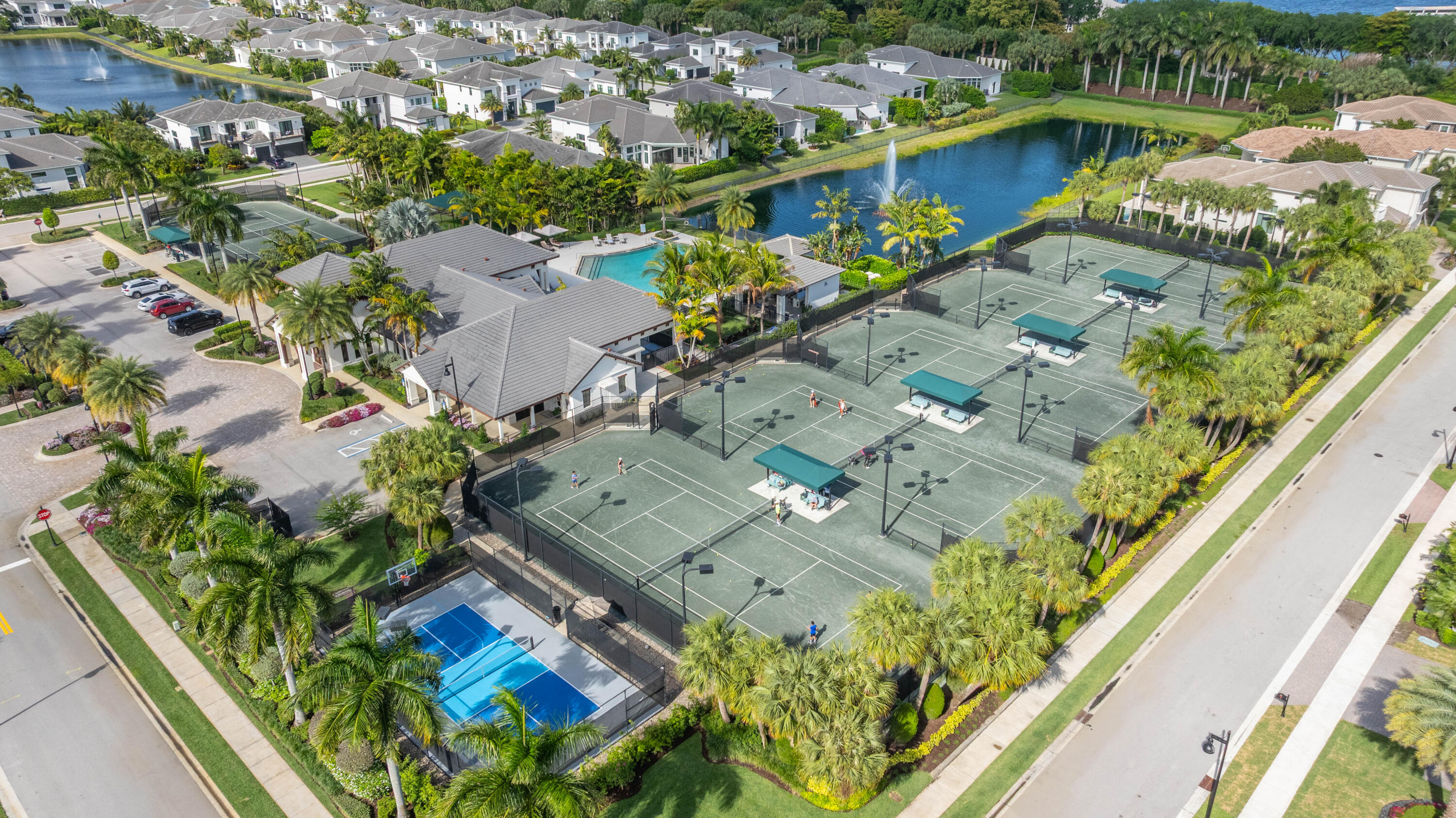 6903 Northwest 28th Avenue Boca Raton, FL 33496 - Photo 60 of 69 an aerial view of a house with a garden and lake view