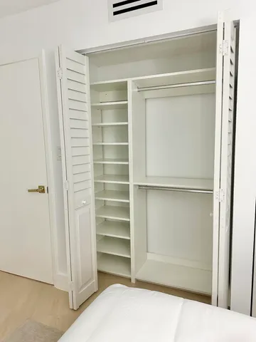 an aerial view of a chairs and table