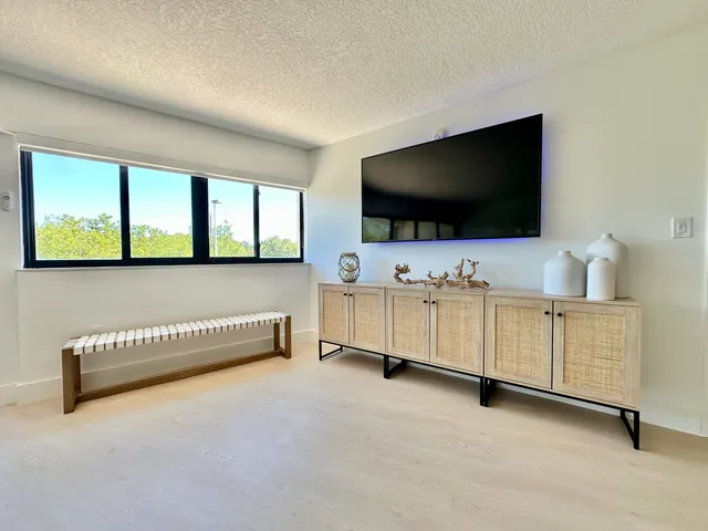 a workspace with furniture and window