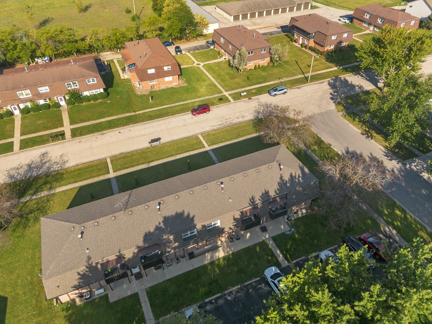 1017 9th Street, Unit 5 Harvard, IL 60033 - Photo 2 of 9 an aerial view of tennis court