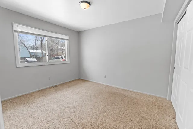 an empty room with windows