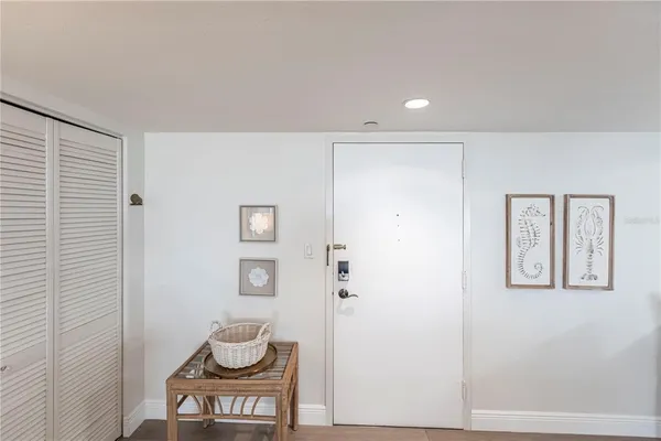 a bathroom with a toilet and a mirror