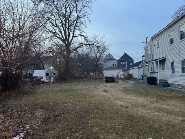 a backyard of a house with lots of green space