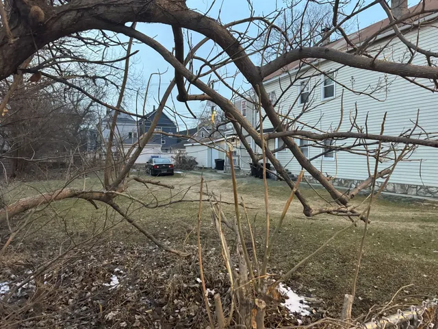 a view of a street with houses