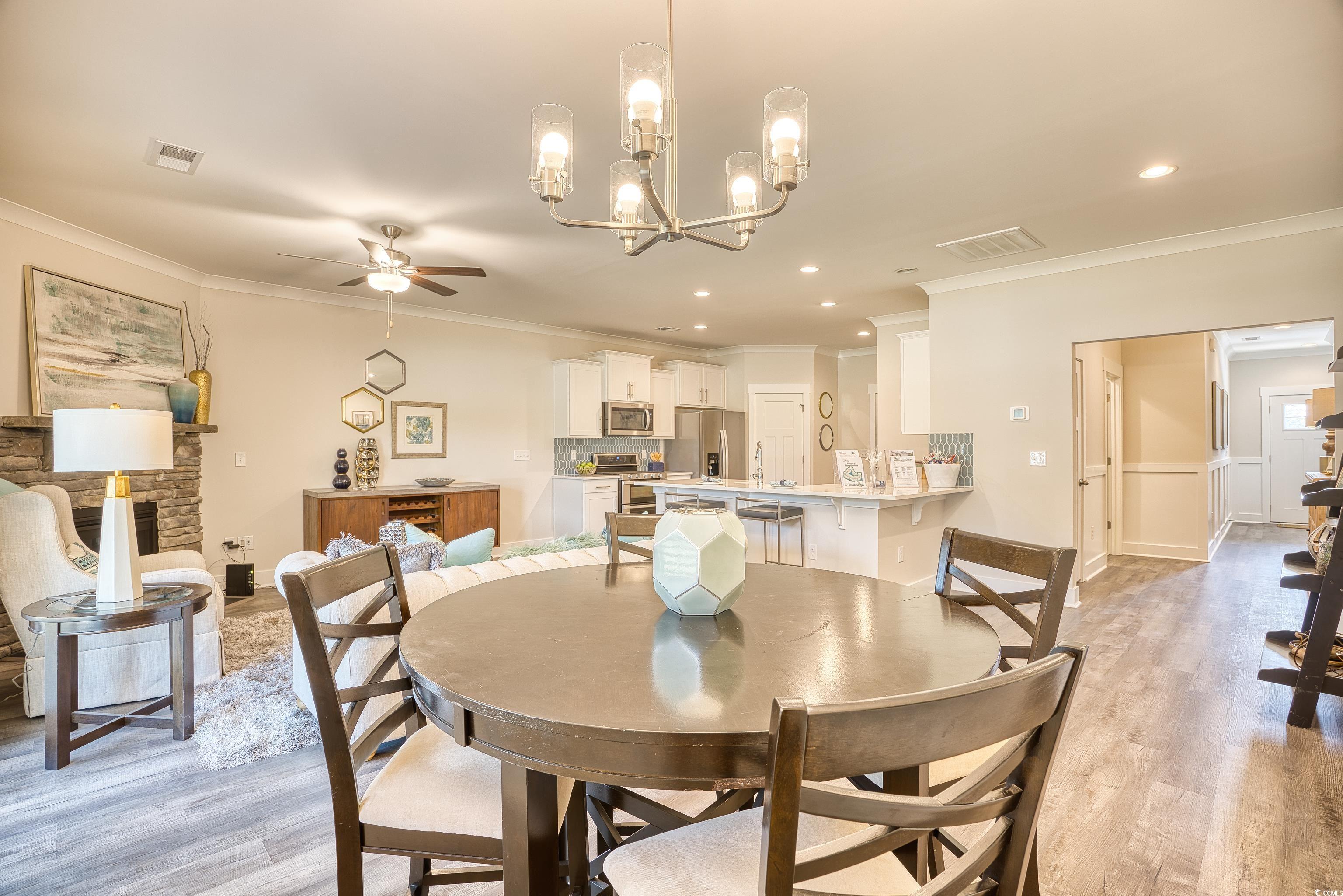 1028 Log Cabin Road Loris, SC 29569 - Photo 11 of 36 Dining area featuring light hardwood / wood-style