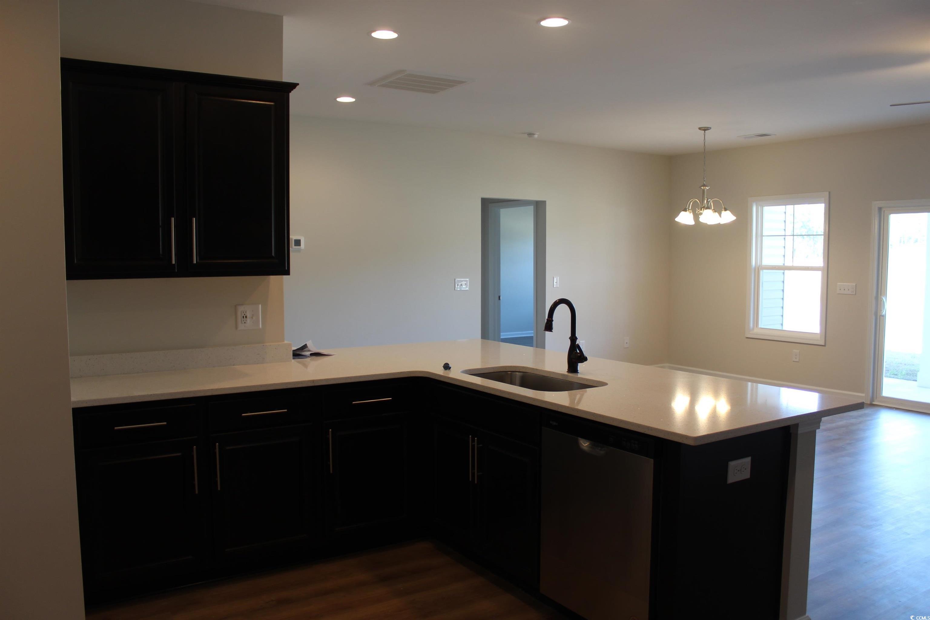 1028 Log Cabin Road Loris, SC 29569 - Photo 23 of 36 Kitchen featuring plenty of natural light, sink, d