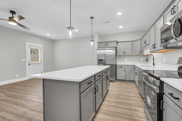 a bathroom with a sink and mirror
