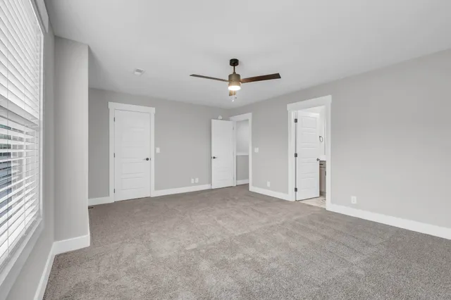a bathroom with a white bath tub