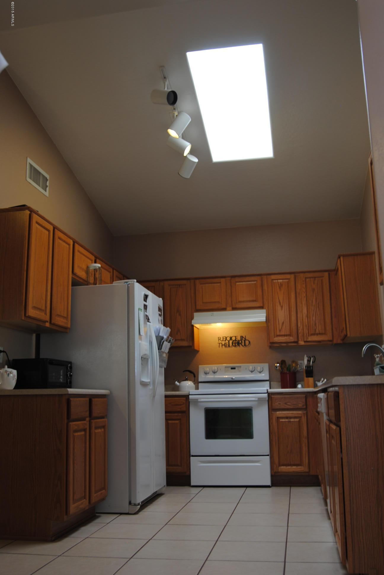 11025 West Almeria Road Avondale, AZ 85392 - Photo 6 of 31 Kitchen w Vaulted Ceilings