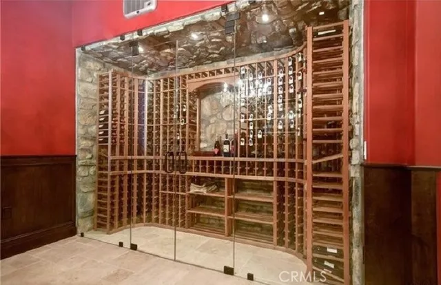 a bedroom with furniture and a fireplace