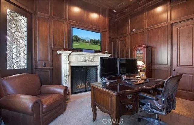 a bathroom with double vanity sinks a large mirror and a shower