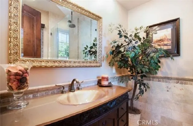 a bathroom with a bathtub and a window