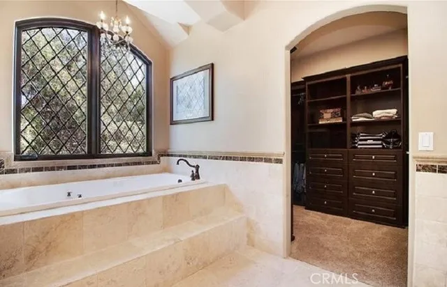 a view of living room with granite countertop furniture and wooden floor