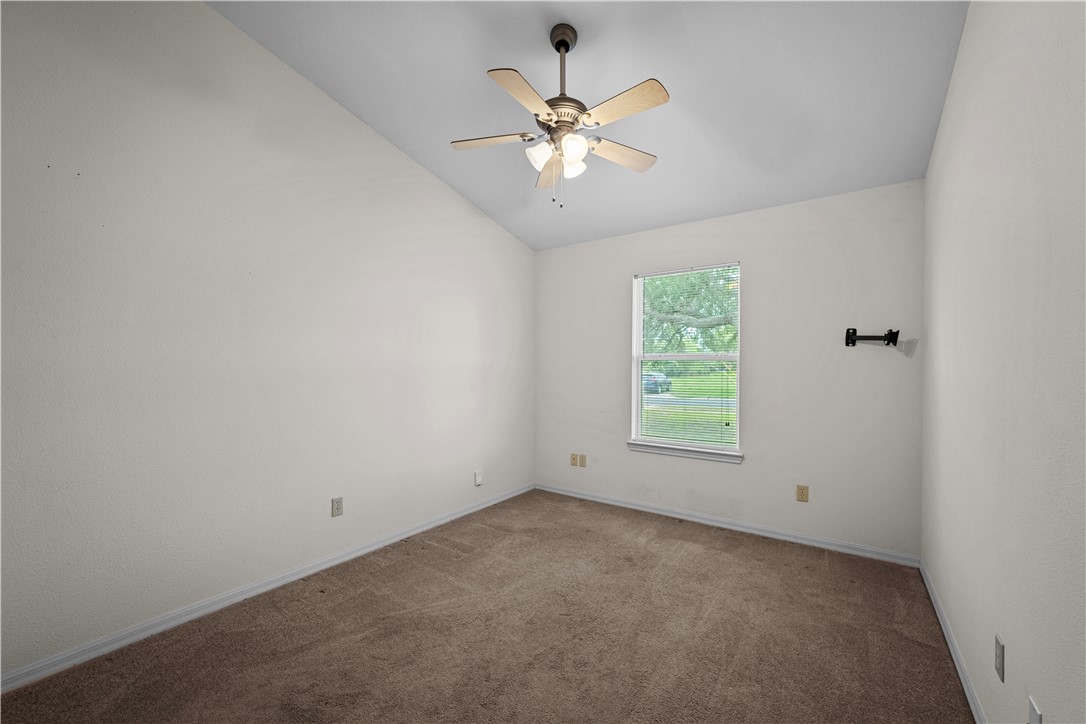 501 Jane Street Corpus Christi, TX 78418 - Photo 14 of 39 an empty room with a window and a fan