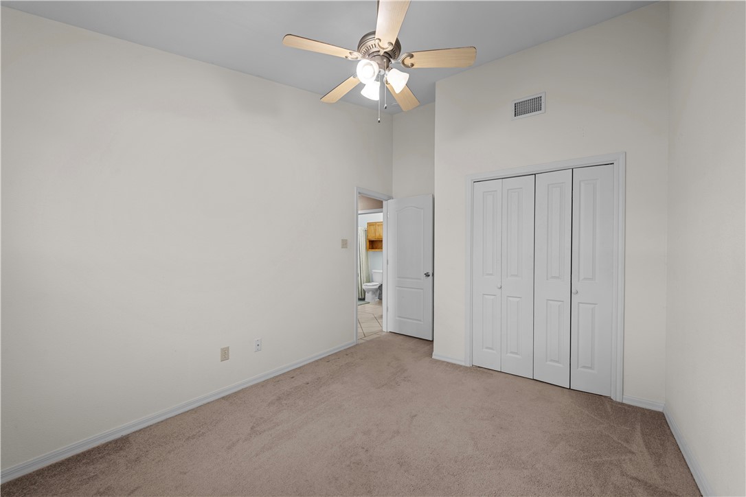 501 Jane Street Corpus Christi, TX 78418 - Photo 18 of 39 an empty room with fan and a ceiling fan