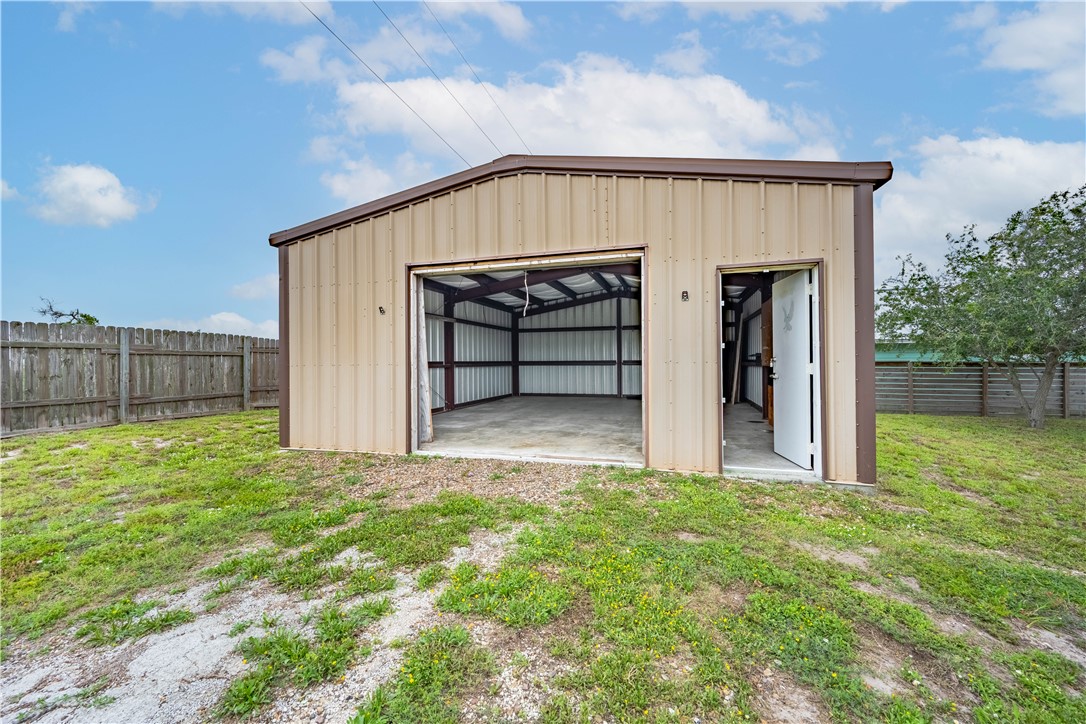 501 Jane Street Corpus Christi, TX 78418 - Photo 3 of 39 a view of backyard of house with seating space