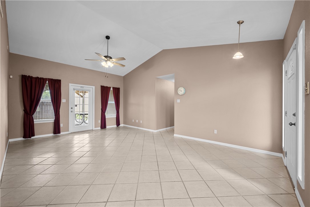 501 Jane Street Corpus Christi, TX 78418 - Photo 5 of 39 a view of an empty room with window and chandelier fan