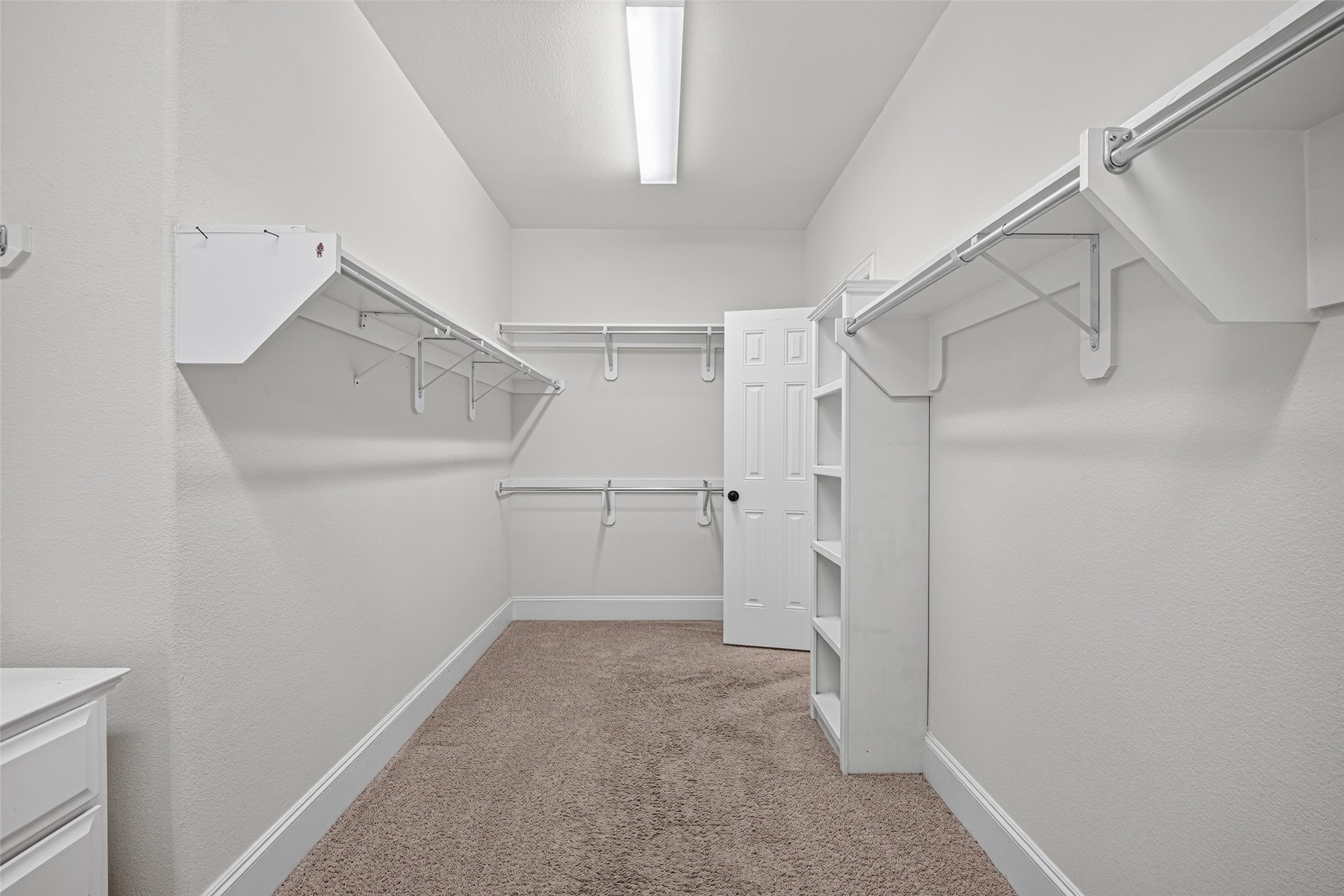 7930 Summer Night Lane Rosenberg, TX 77469 - Photo 25 of 48 Expansive walk-in closet with custom built-in shelving and abundant storage space.