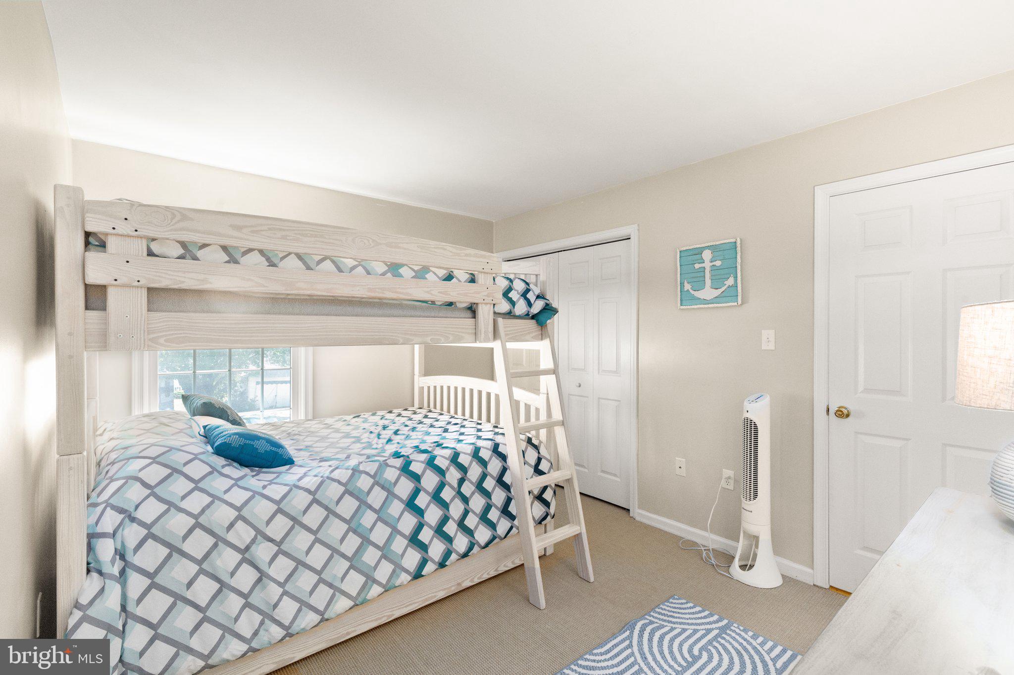 21 Heisler Avenue North East, MD 21901 - Photo 18 of 55 a bedroom with a bed and a mirror