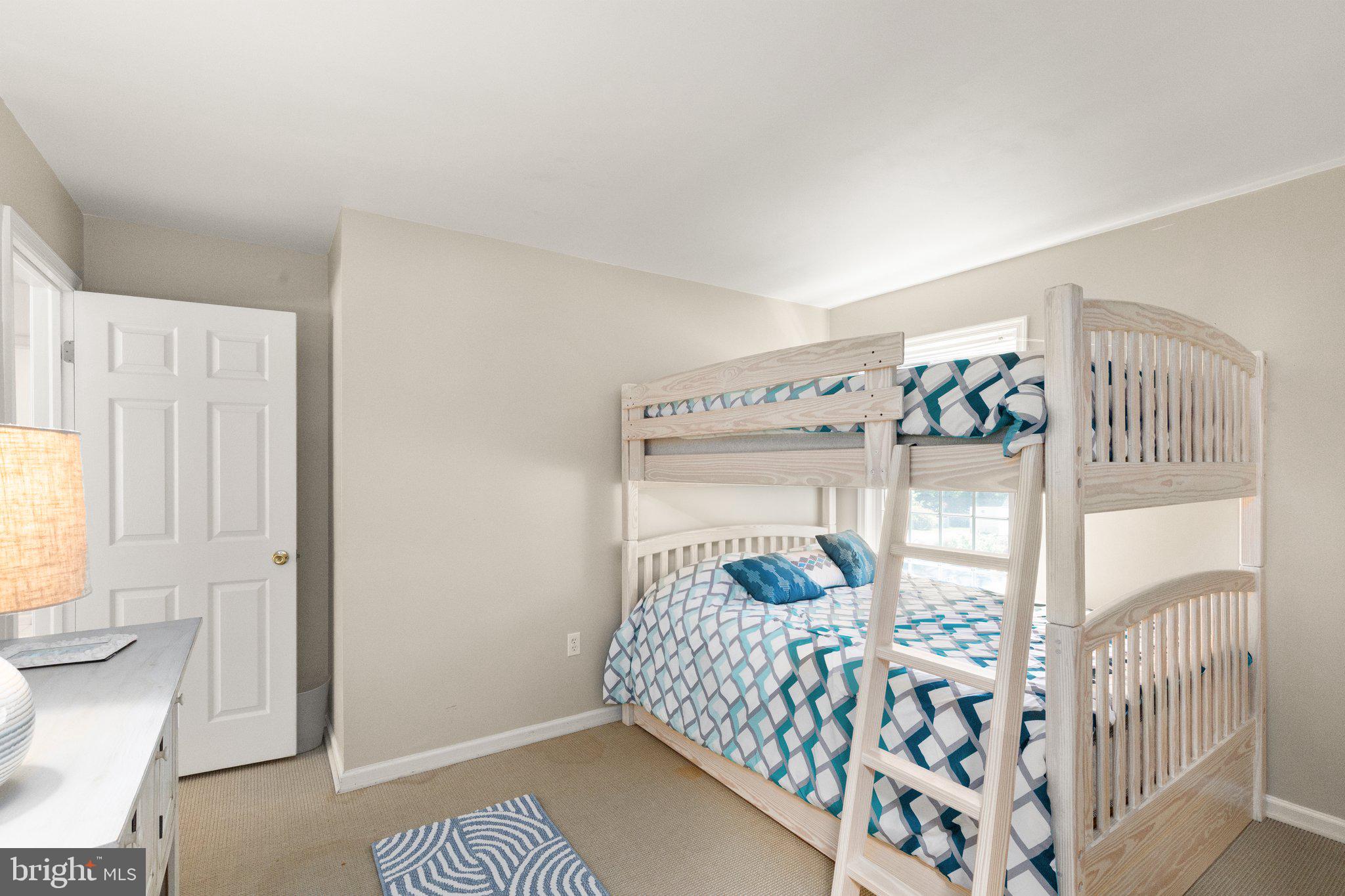 21 Heisler Avenue North East, MD 21901 - Photo 19 of 55 a bedroom with a bed and a window