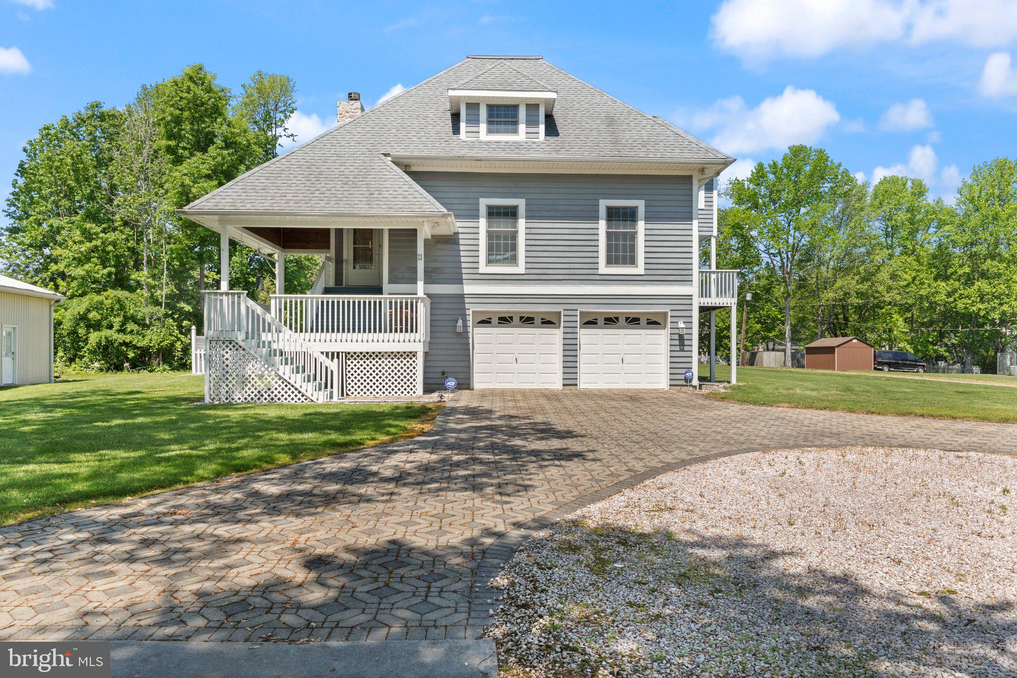21 Heisler Avenue North East, MD 21901 - Photo 2 of 55 a front view of a house with a yard and garage