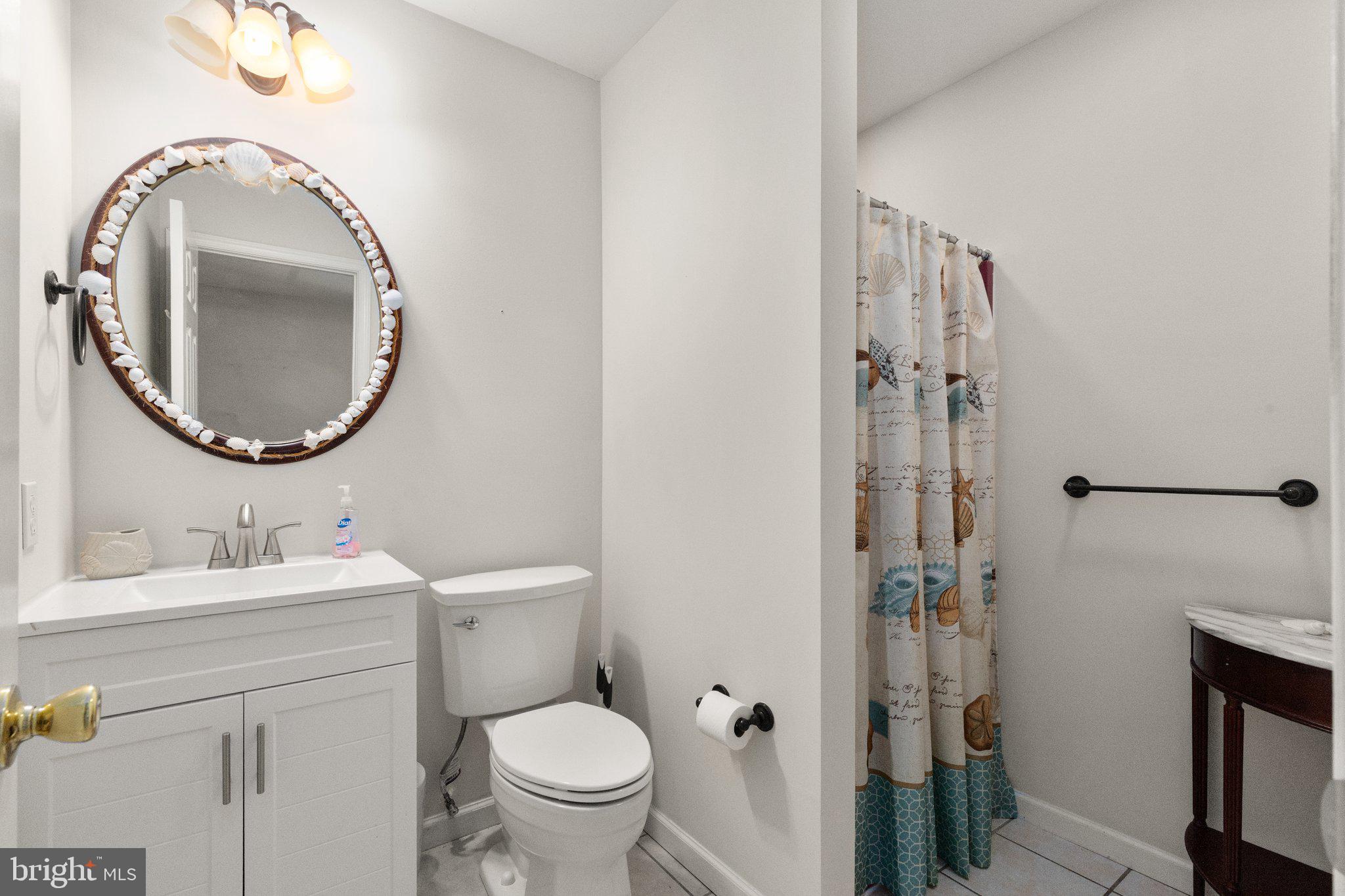 21 Heisler Avenue North East, MD 21901 - Photo 35 of 55 a bathroom with a toilet sink and mirror