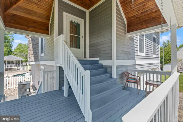 a view of two chairs with a table and chairs