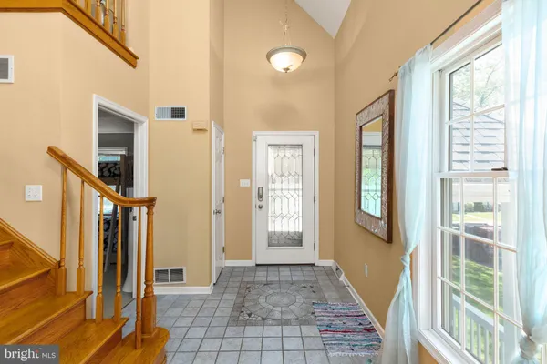 a view of an entryway with livingroom