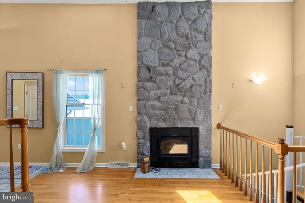 a living room with a fireplace