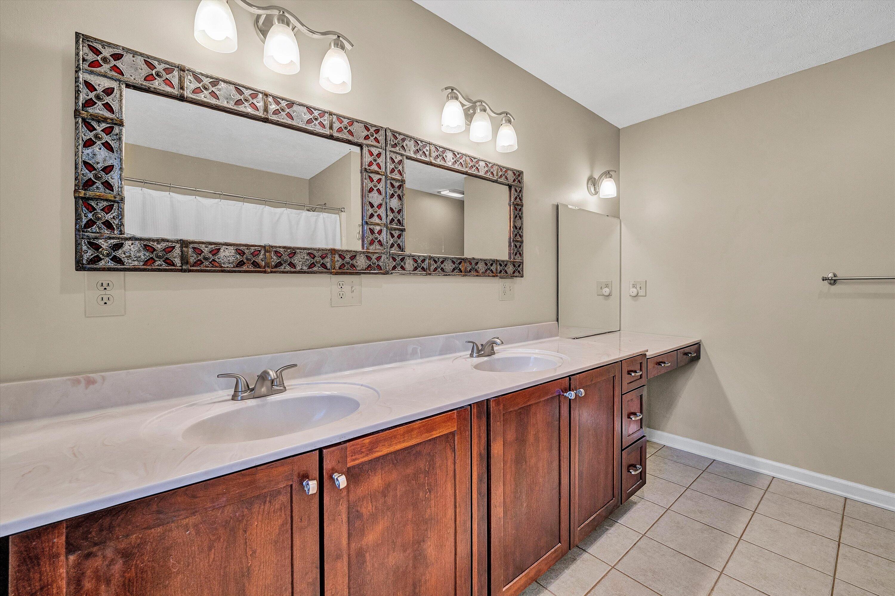 400 Harbor Moneta, VA 24121 - Photo 23 of 51 a bathroom with a double vanity sink and a mirror