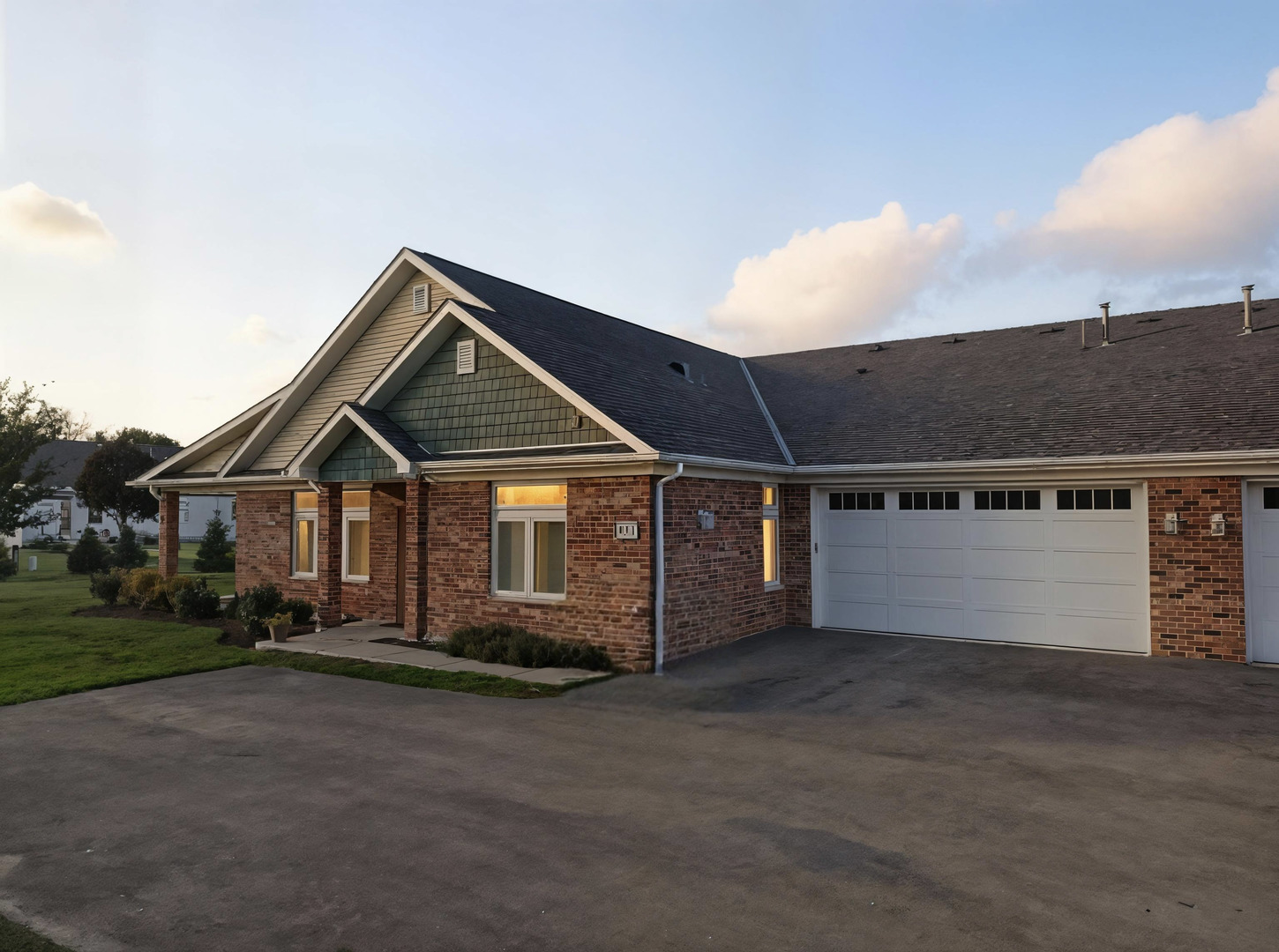 437 Stearn Drive, Unit 437 Genoa, IL 60135 - Photo 1 of 50 a front view of a house with a yard