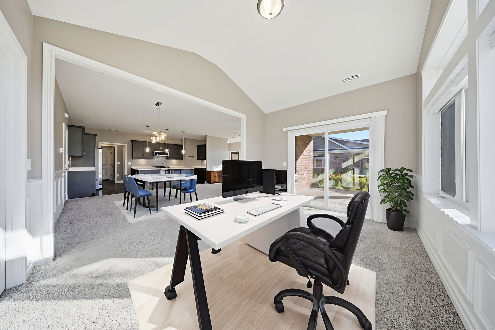 437 Stearn Drive, Unit 437 Genoa, IL 60135 - Photo 12 of 50 a view of a dining room with furniture and a potted plant