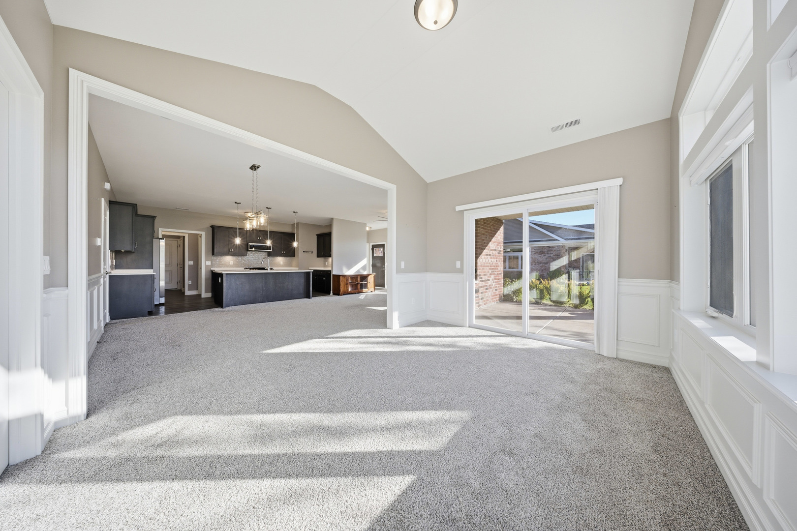 437 Stearn Drive, Unit 437 Genoa, IL 60135 - Photo 20 of 50 a view of living room and kitchen with furniture