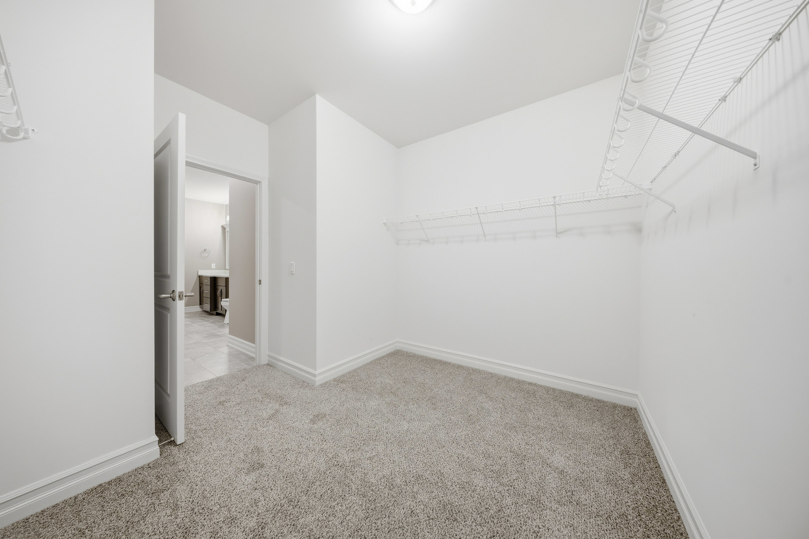 437 Stearn Drive, Unit 437 Genoa, IL 60135 - Photo 31 of 50 a view of an empty room