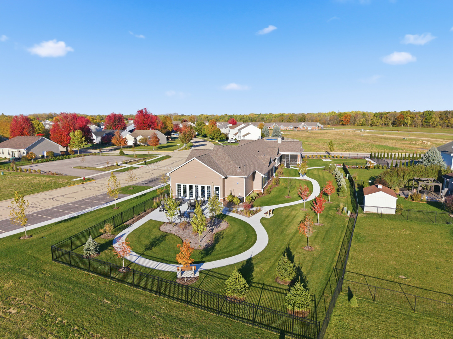 437 Stearn Drive, Unit 437 Genoa, IL 60135 - Photo 48 of 50 swimming pool table and chairs with the view of city