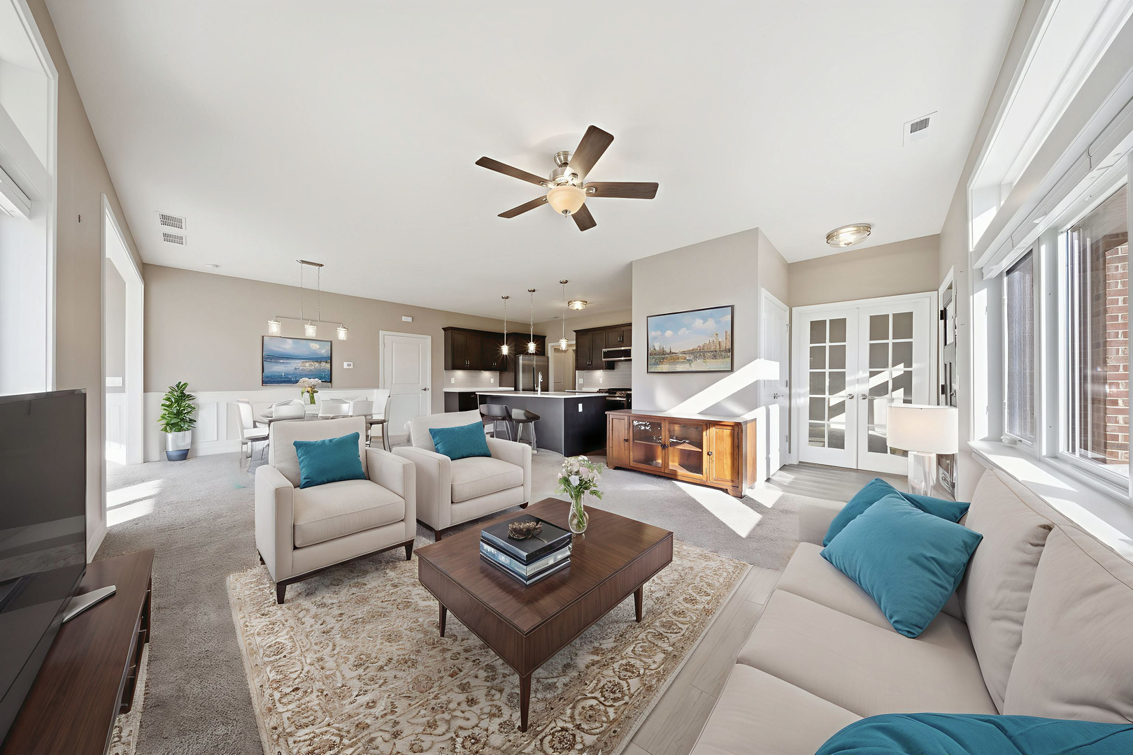 437 Stearn Drive, Unit 437 Genoa, IL 60135 - Photo 10 of 50 a living room with furniture ceiling fan and a rug