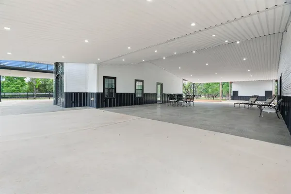 a view of a hall and with a large window