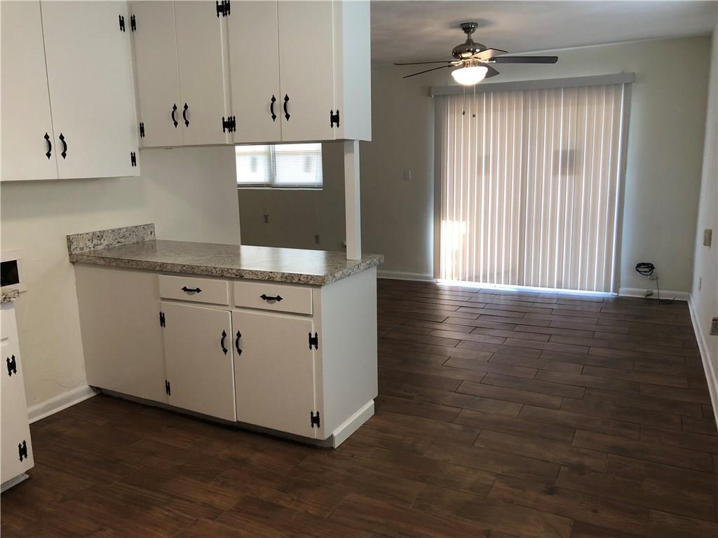 800 St James Church Road Newton, NC 28658 - Photo 18 of 27 a view of cabinets with wooden floor
