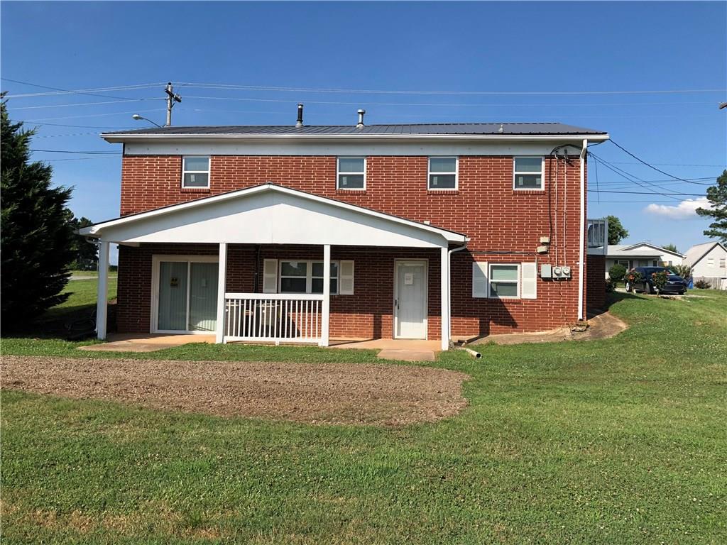800 St James Church Road Newton, NC 28658 - Photo 24 of 27 a front view of a house with a yard
