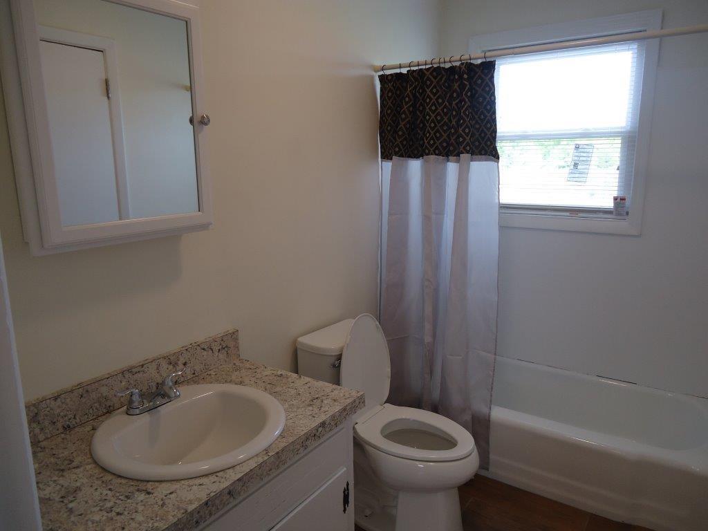 800 St James Church Road Newton, NC 28658 - Photo 4 of 27 a bathroom with a sink toilet and shower
