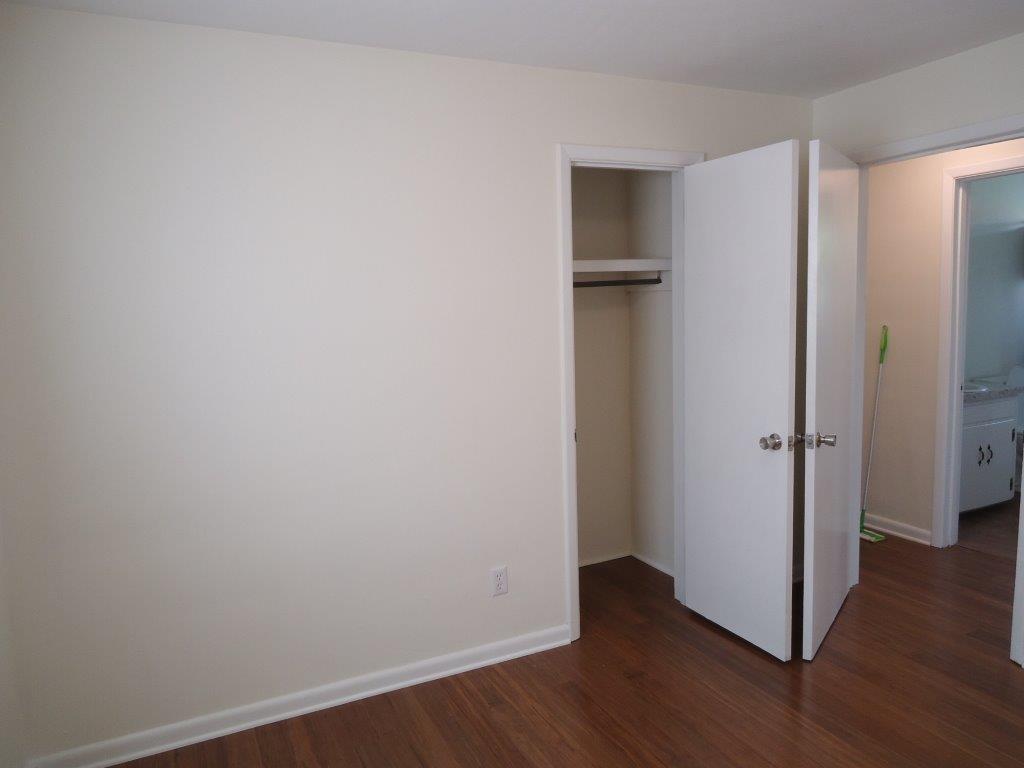 800 St James Church Road Newton, NC 28658 - Photo 6 of 27 a view of an empty room with wooden floor