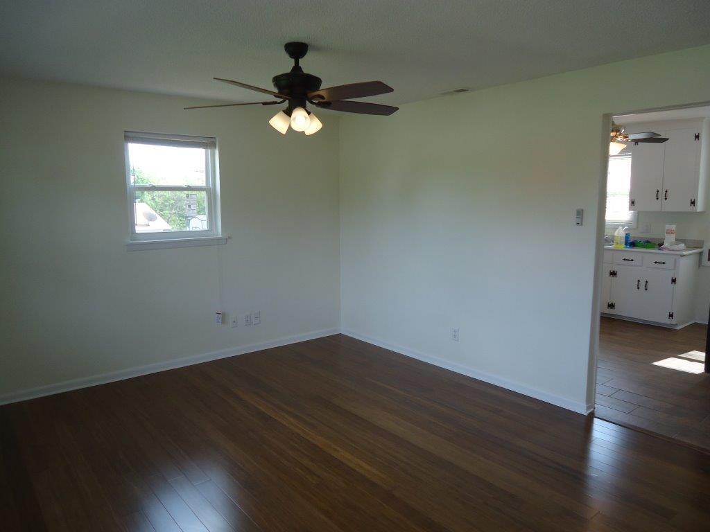 800 St James Church Road Newton, NC 28658 - Photo 7 of 27 a view of a livingroom with wooden floor