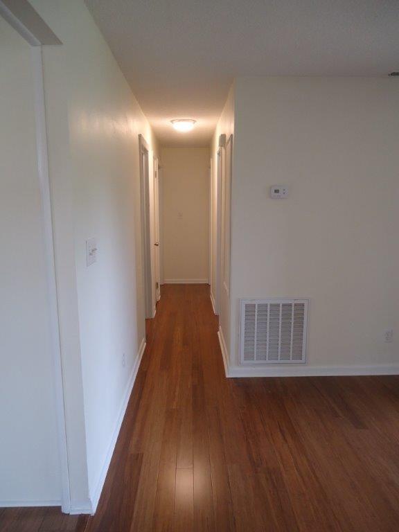 800 St James Church Road Newton, NC 28658 - Photo 10 of 27 a view of a hallway with wooden floor