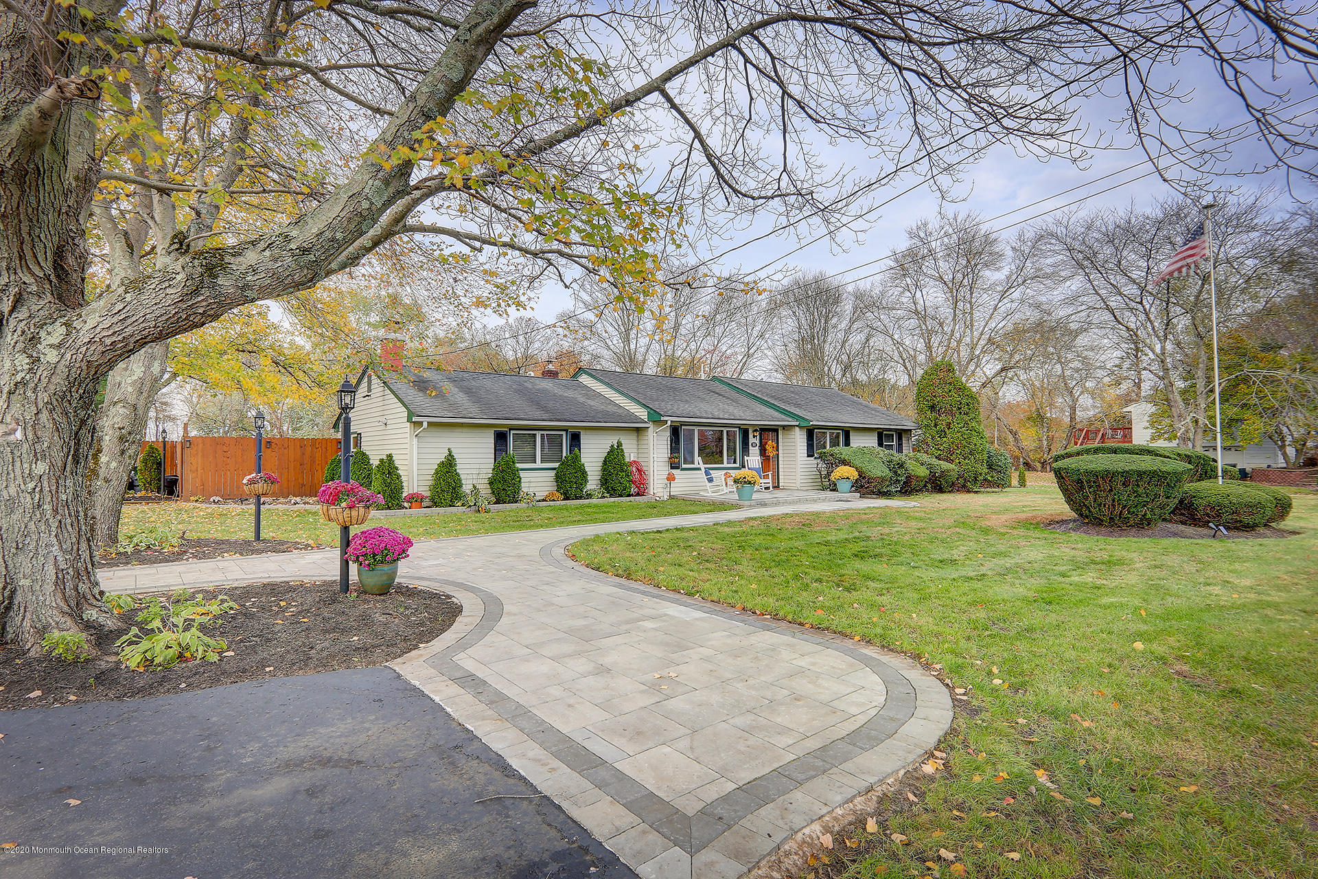 a front view of a house with garden