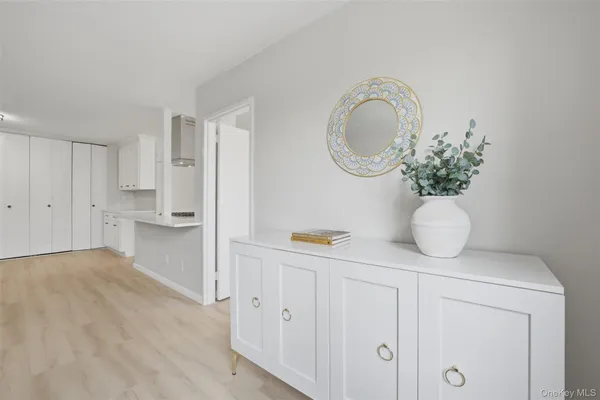 a view of a storage & utility room with wooden floor